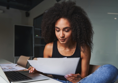 A woman reading a contract